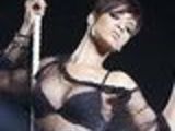 Rihanna nearly nude on swing