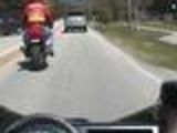 Motorcycle Crashes Into Minivan