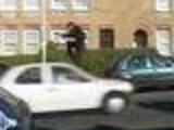 Dude jumps over a car