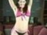 Sexy girl in bikini is doing a strip