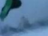 Snowboarder crashes cameraman