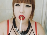  CIGARETTE DANGLING AND SMOKING CLOSE UP WITH RED LIPS 